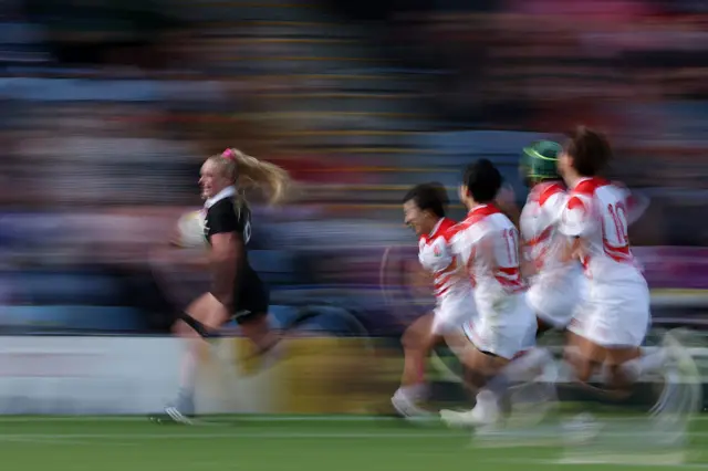 Jorja Miller scoring a try