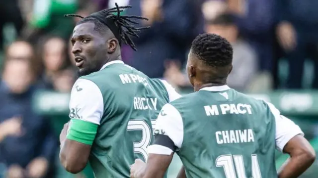 Hibs' Rocky Bushiri (left) celebrates