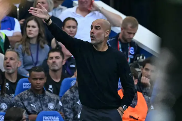 Pep Guardiola gestures