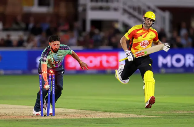 Saqib Mahmood of Oval Invincibles runs out Sam Hain of Trent Rockets
