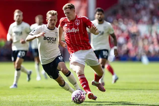 Nottingham Forest's Elliot Anderson competing with West Ham United's James Ward-Prowse