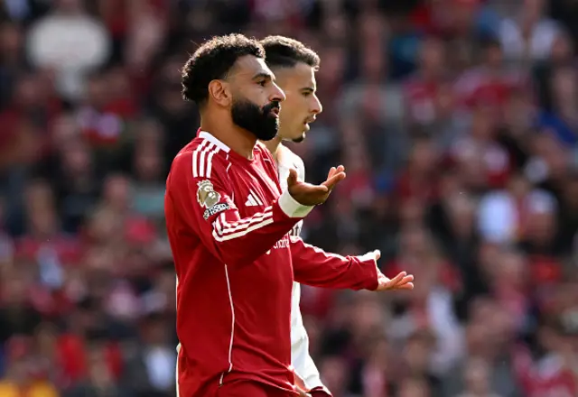 Mohamed Salah of Liverpool reacts