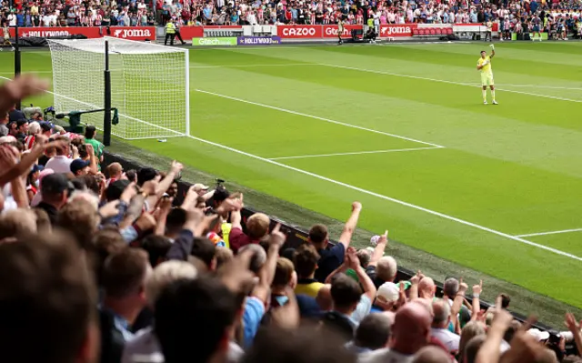 Emiliano Martinez of Aston Villa acknowledges the fans