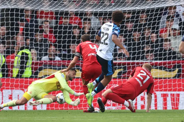 Falkirk's Kyrell Wilson scores