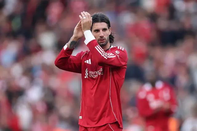Dominik Szoboszlai of Liverpool applauds the fans