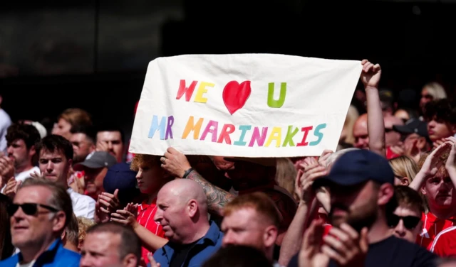 Nottingham Forest fan holds up a banner