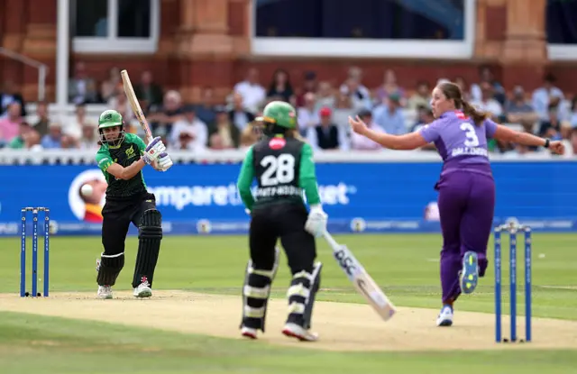 Maia Bouchier hits out for four off the bowling of Grace Ballinger