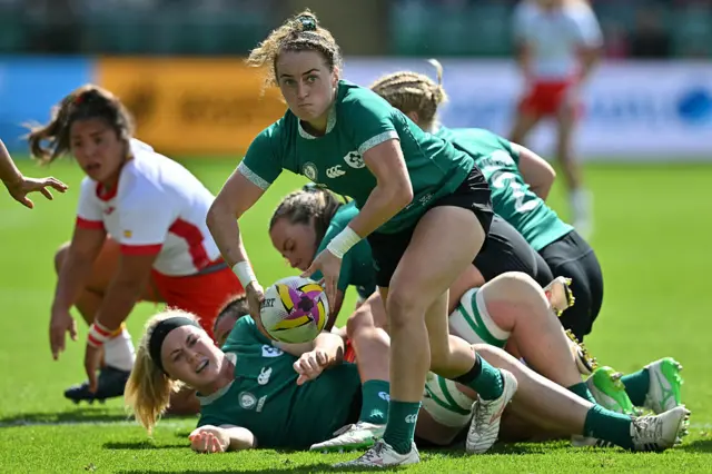 Ireland's scrum half Molly Scuffil-McCabe passes the ball during the Women's Rugby World Cup pool C against Spain
