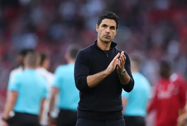 Mikel Arteta, Manager of Arsenal, applauds the fans