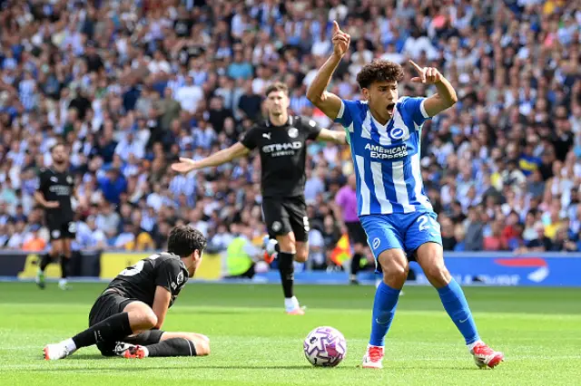 Diego Gomez of Brighton & Hove Albion reacts after clashing with Abdukodir Khusanov