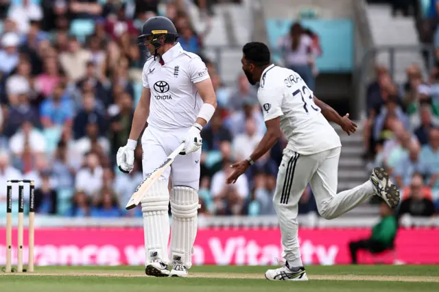 Siraj celebrates the wicket of Smith