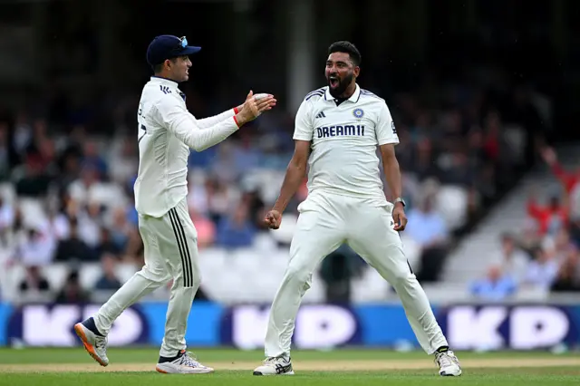 Siraj celebrates the wicket of Overton