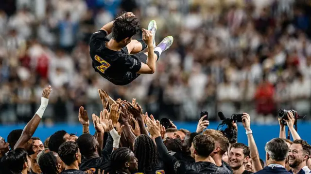 Teammates lift Tottenham Hotspur's captain Son Heung-min up in the air during celebrations to bid him farewell