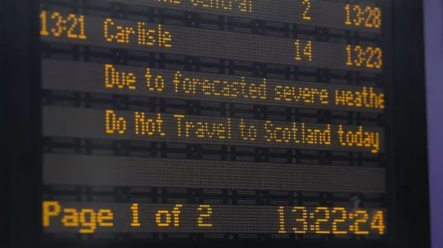 A train station sign tells travellers not to go to Scotland