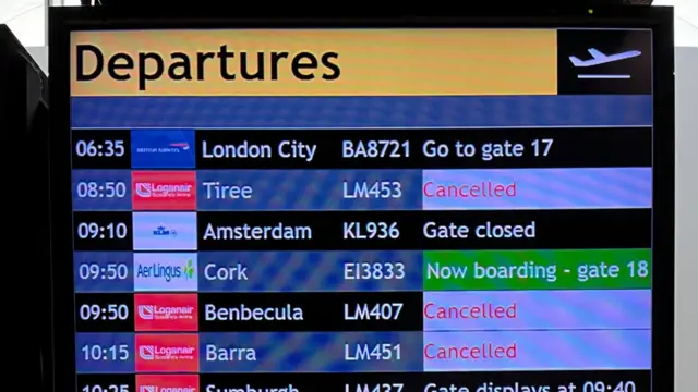 A departure board at Glasgow Airport showing some cancellations