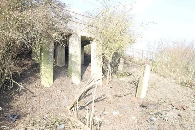 A closer view of the area Roy Barclay was camping in in Brantham. It is a hill with a concrete structure that provides some shelter.