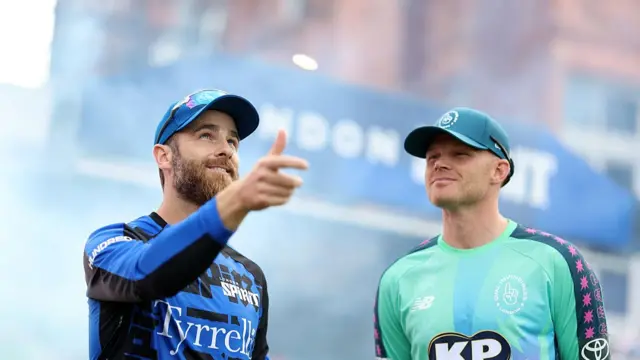 Kane Williamson, Captain of London Spirit tosses the coin alongside Sam Billings, Captain of Oval Invincibles