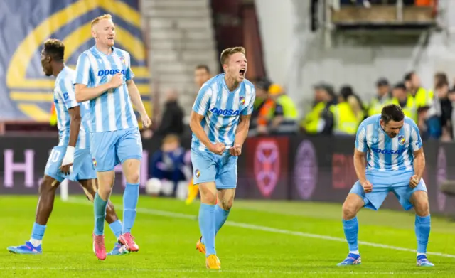 Viktoria Plzen players celebrate their victory at Tynecastle