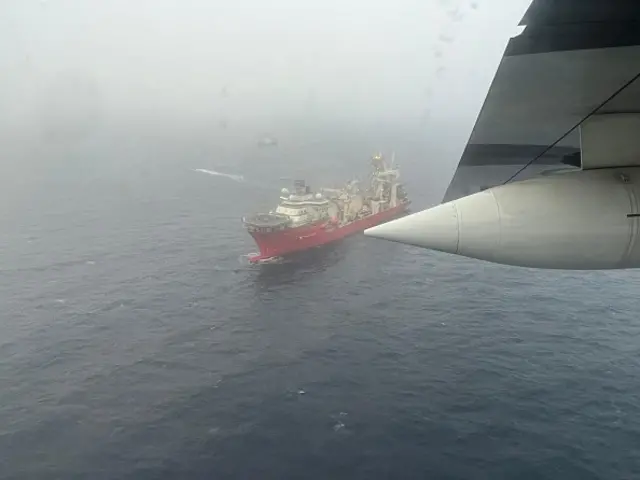 An aerial view of the Bahamian research vessel Deep Energy ship after it arrived in the area for OceanGate Titan Submersible. Search and rescue operations continued by US Coast Guard in June after the tourist submarine bound for the Titanic's wreckage site went missing off the southeastern coast of Canada