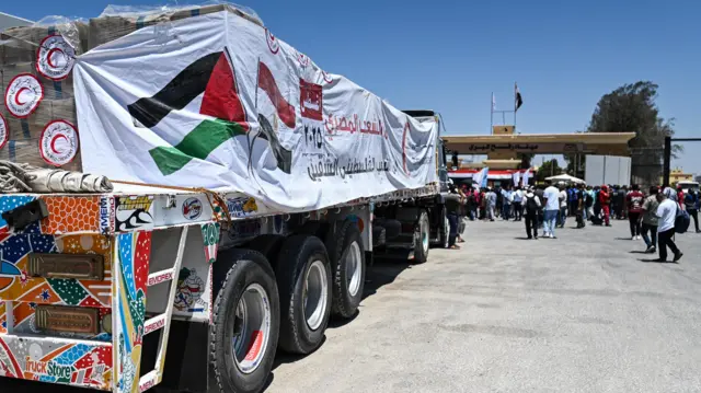 Aid trucks entering Gaza on the Rafah crossing