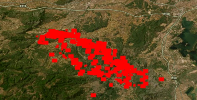 Nasa Firms satellite data superimposed over a satellite map showing multiple heat sources near Ribaute in France