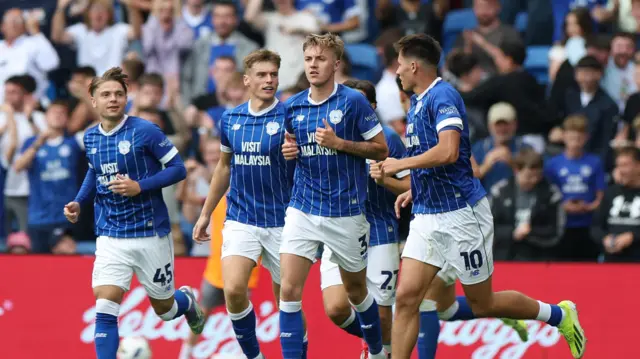Cardiff City players celebrate Rubin Colwill's goal against Peterborough on Saturday
