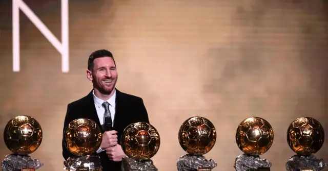 Barcelona's Argentinian forward Lionel Messi reacts after winning the Ballon d'Or