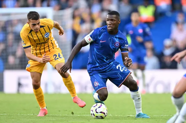 Moises Caicedo of Chelsea is challenged by Yasin Ayari of Brighton