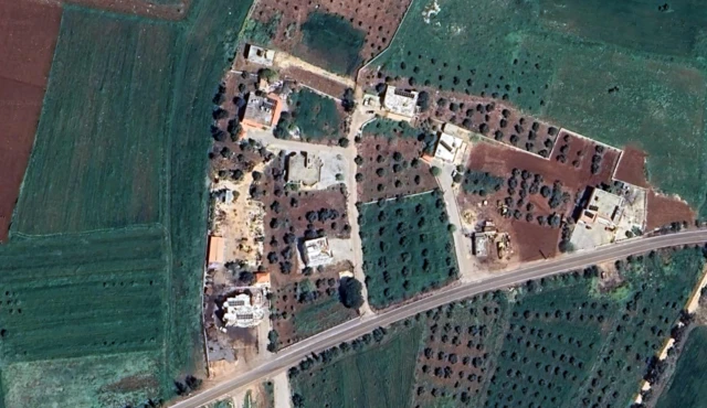 Screengrab of satellite image from Google Maps showing several buildings north of a road outside Deir Seryan, Lebanon.