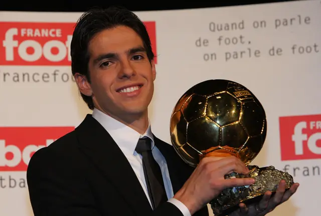 AC Milan's Brazilian midfielder Kaka poses with his trophy after being awarded as France Football's Player of the Year winning the prestigious Ballon d'Or award