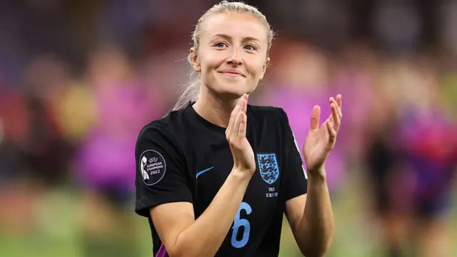 Leah Williamson of England acknowledges the fans