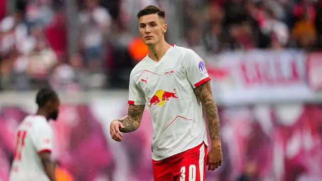 Benjamin Sesko of RB Leipzig looks on