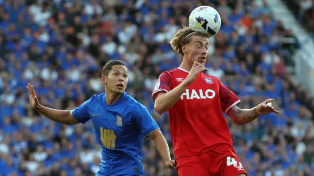 Tomoki Iwata of Birmingham City and Jack Clarke of Ipswich Town in action