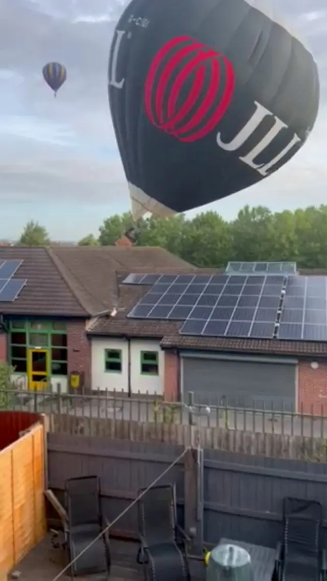 Balloon hits school roof