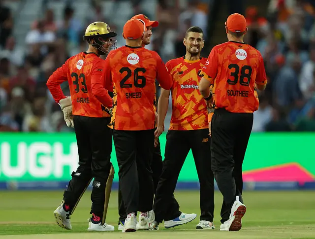 Benny Howell and Birmingham Phoenix celebrate a wicket