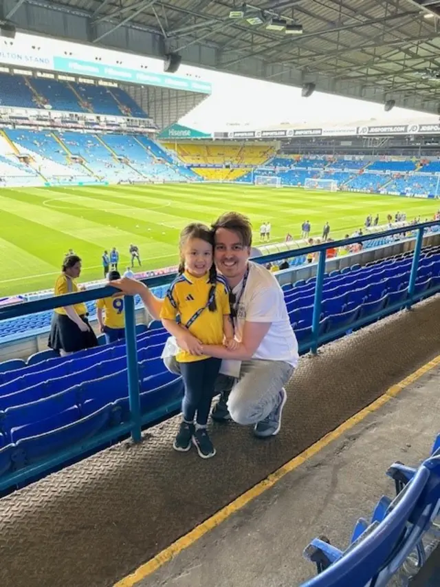 Jonny Buchan and daughter Cleo at Elland Road