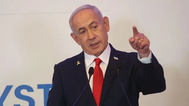 Israeli Prime Minister Benjamin Netanyahu gestures while speaking