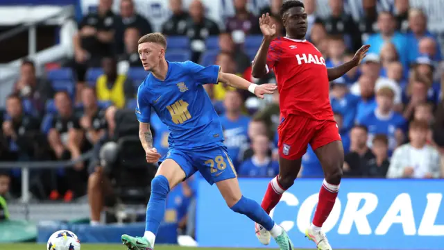 Jay Stansfield of Birmingham City and Ben Johnson of Ipswich Town in action