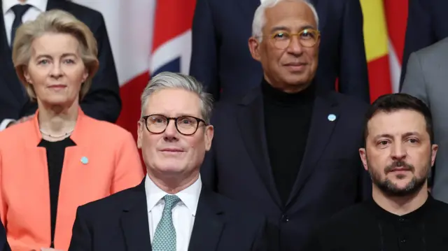 A picture showing Ukrainian President Volodymyr Zelensky with British Prime Minister Keir Starmer, European Commission President Ursula von der Leyen and European Council president Antonio Costa