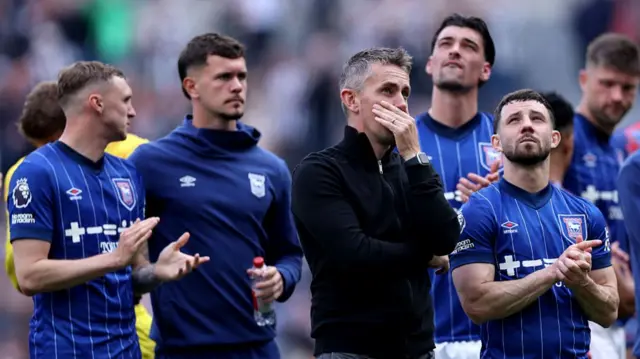 Disappointed Ipswich players and boss Kieran McKenna after relegation from the Premier League