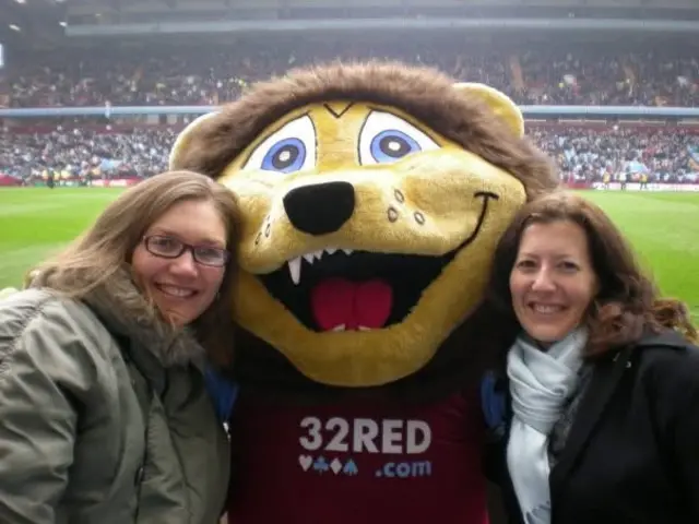 Two women with Aston Villa mascot