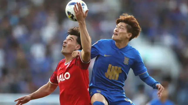 Jacob Greaves of Ipswich Town and Kyogo Furuhashi of Birmingham City in action