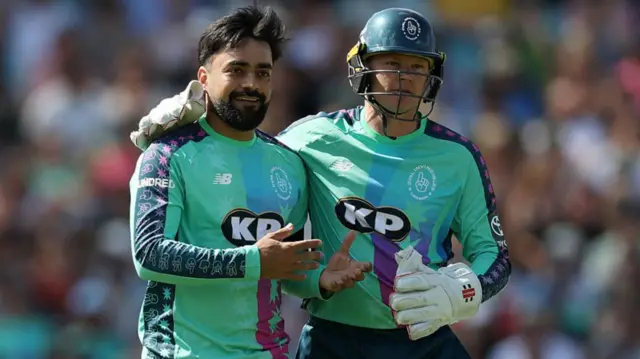 Rashid Khan and Sam Billings