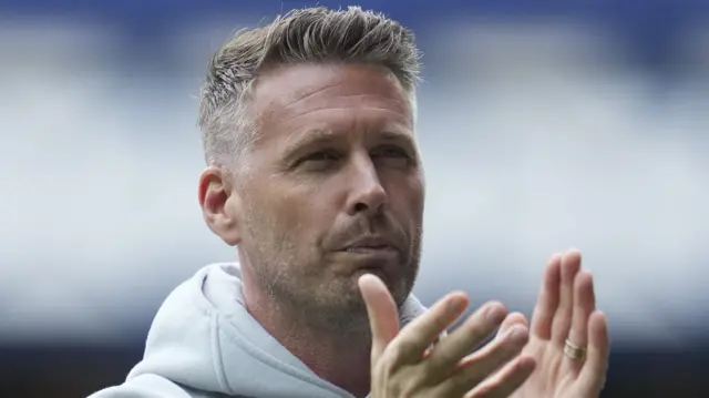 Rob Edwards clapping