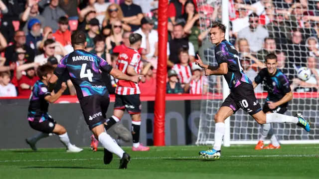 Scott Twine celebrates his free-kick