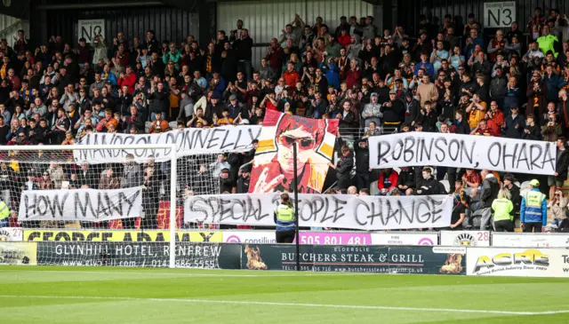 Motherwell fans create an Oasis style display which reads 'Mandron, Donnelly, Robinson, O'hara how mnay special people change'