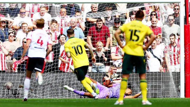 Josh Windass of Wrexham scores a goal to make the score 0-1.
