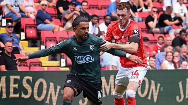 Imran Louza of Watford in action with Sonny Carey of Charlton Athletic