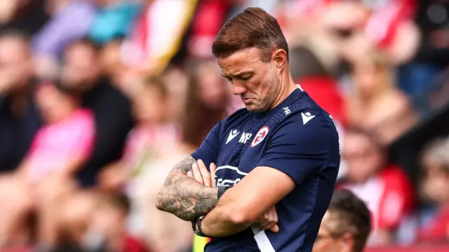 A downcast looking Reading boss Noel Hunt