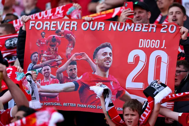 Forever our number 20 banner held up by Liverpool fans